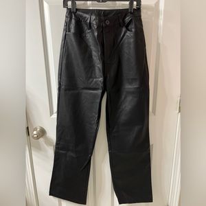 NWT Faux leather black boot cut pants.